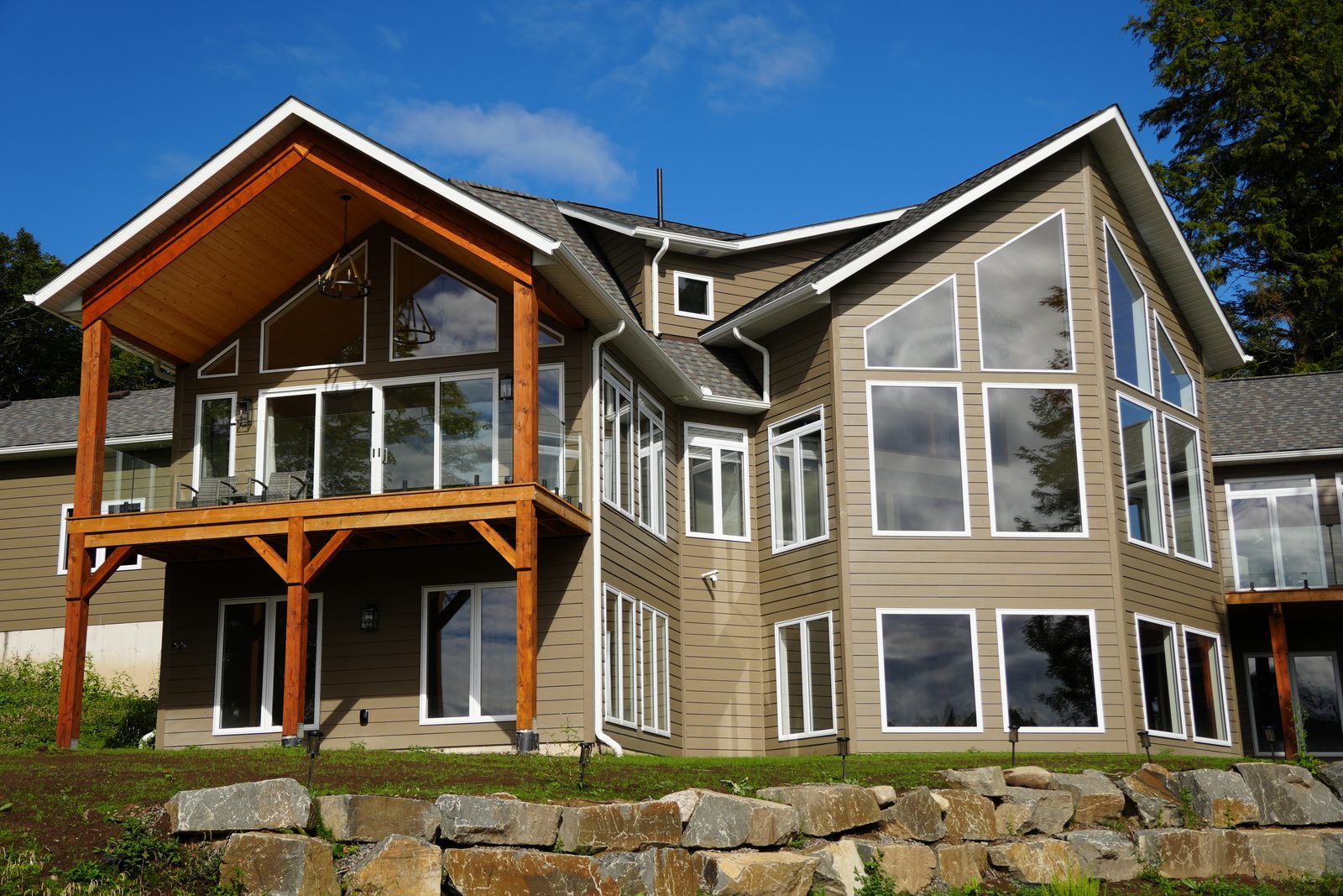 Lakeside elevation with timber gables and window walls